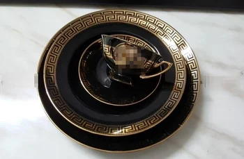 Porceliano indai, dubenys, kavos puodelius ir lėkštutes, keraminiai stalo reikmenys, juoda galva, vakarų stiliaus stalo